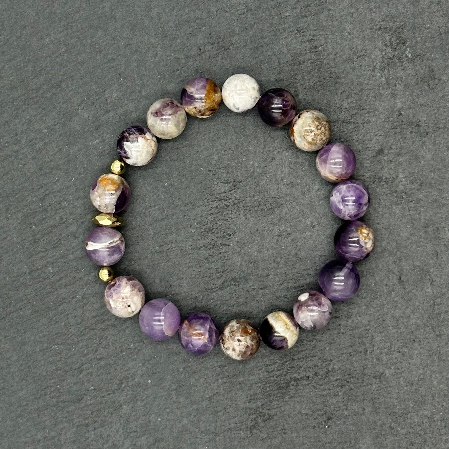 Aproce no dabīgiem Drūzu Ametista (Amethyst) akmeņiem